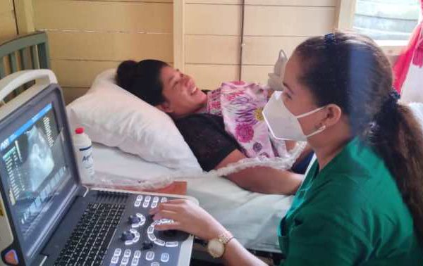 Cuban Dr Yumi Cambar performs an ultrasound scan on this expectant mother during the Ministry of Health’s specialist medical outreach in Region Two