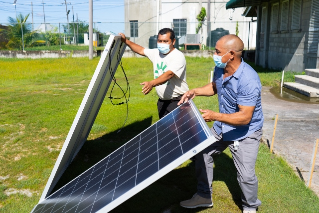 Participants setting up the Photovoltaic system