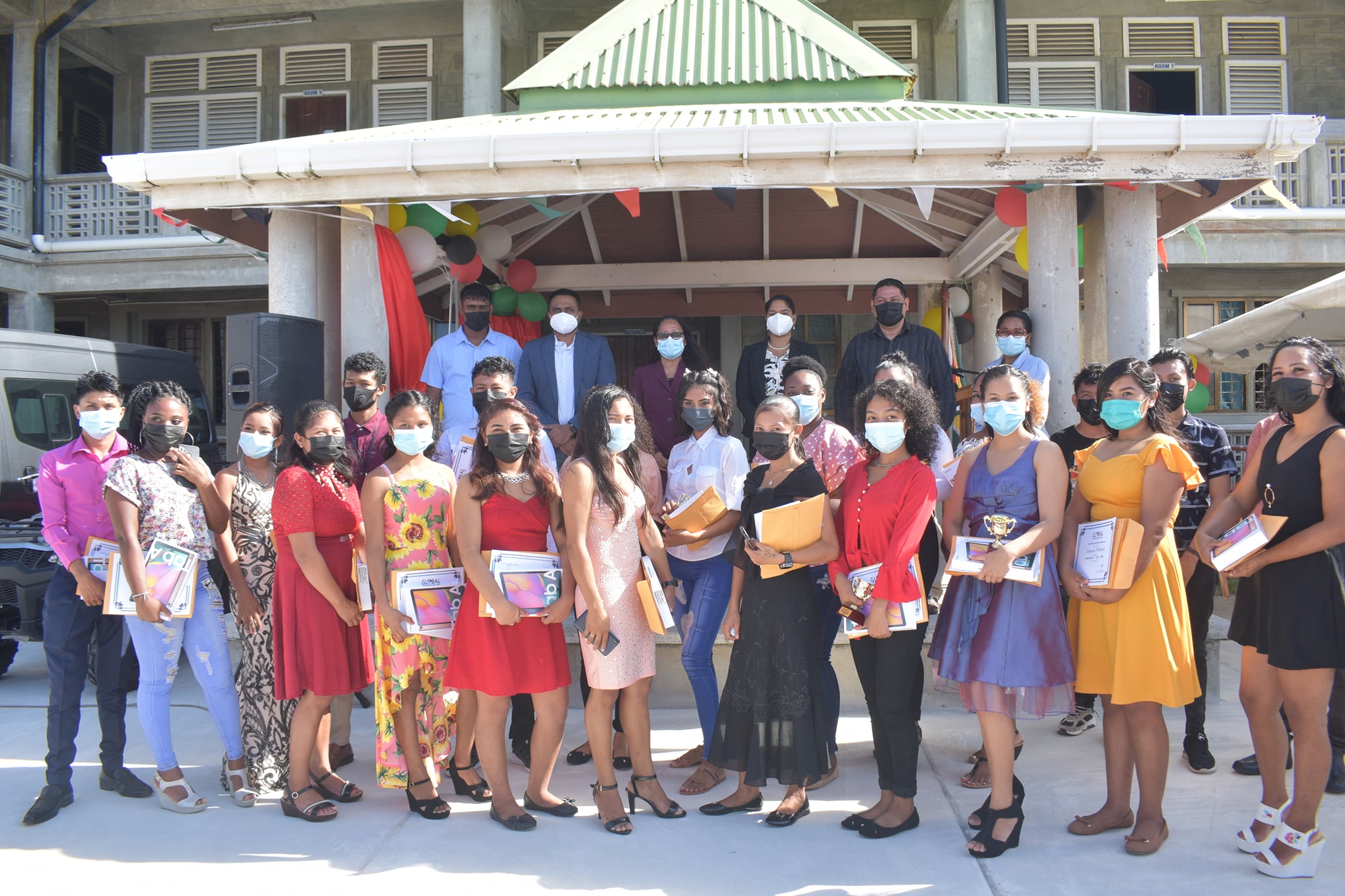 Ministers, Hon. Pauline Sukhai, Hon. Sonia Parag and Hon. Nigel Dharamlall share a photo moment with the new ICT graduates.